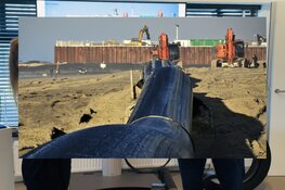 Winnaars fotowedstrijd ‘zandkasteel’ TenneT nemen hun prijs in ontvangst