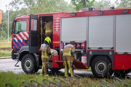 Houten platen van leegstaand poppodium in brand gestoken